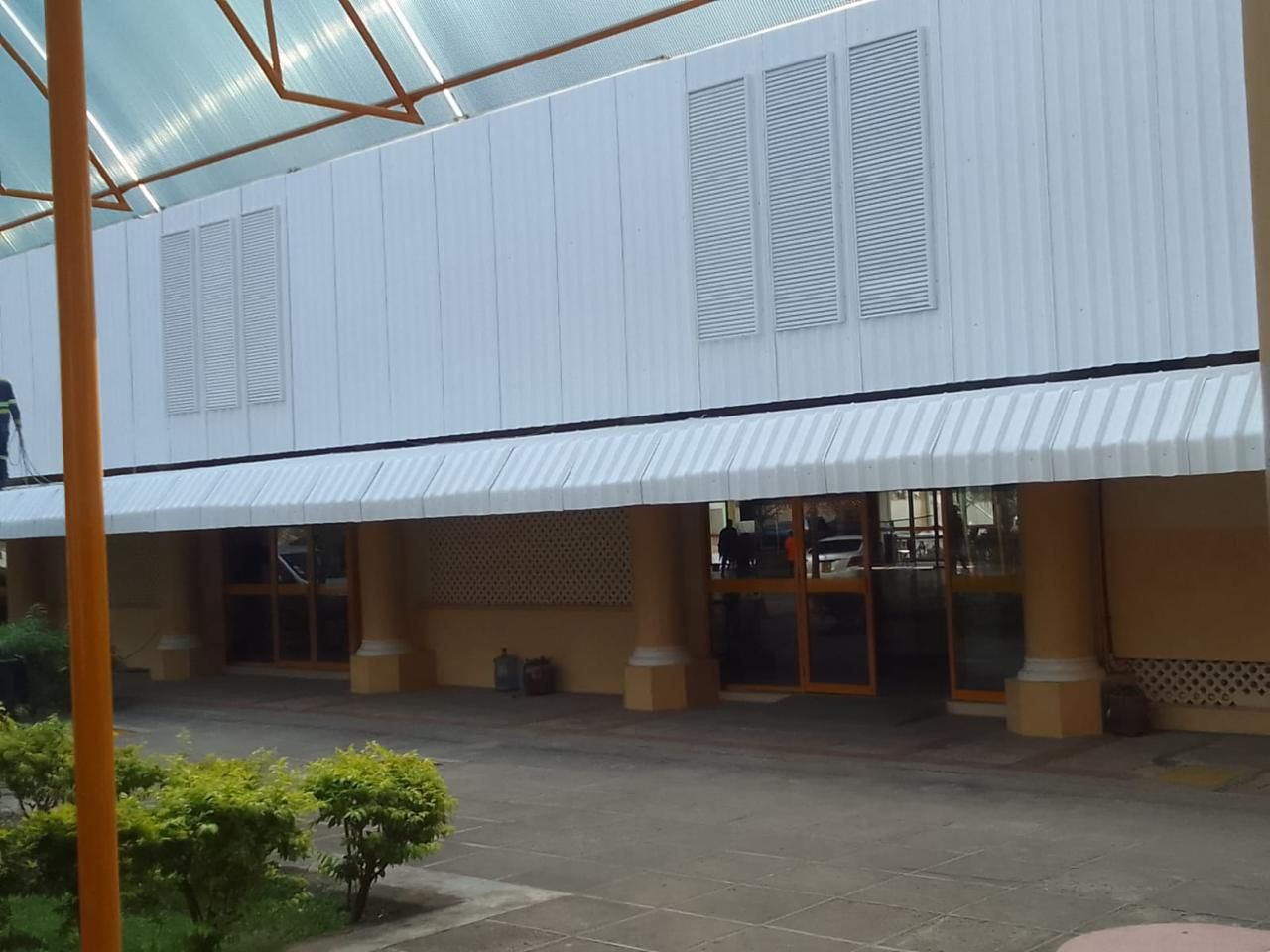 White Muwi FRP louvers on a factory wall