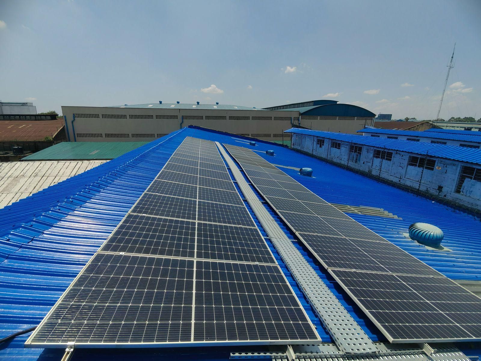 Solar panels on a blue Muwi ACT roof