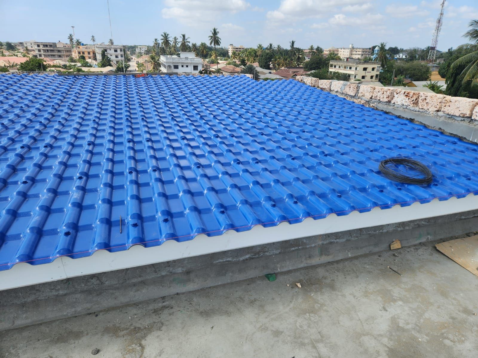 Blue Muwi SRT tiles on a home
