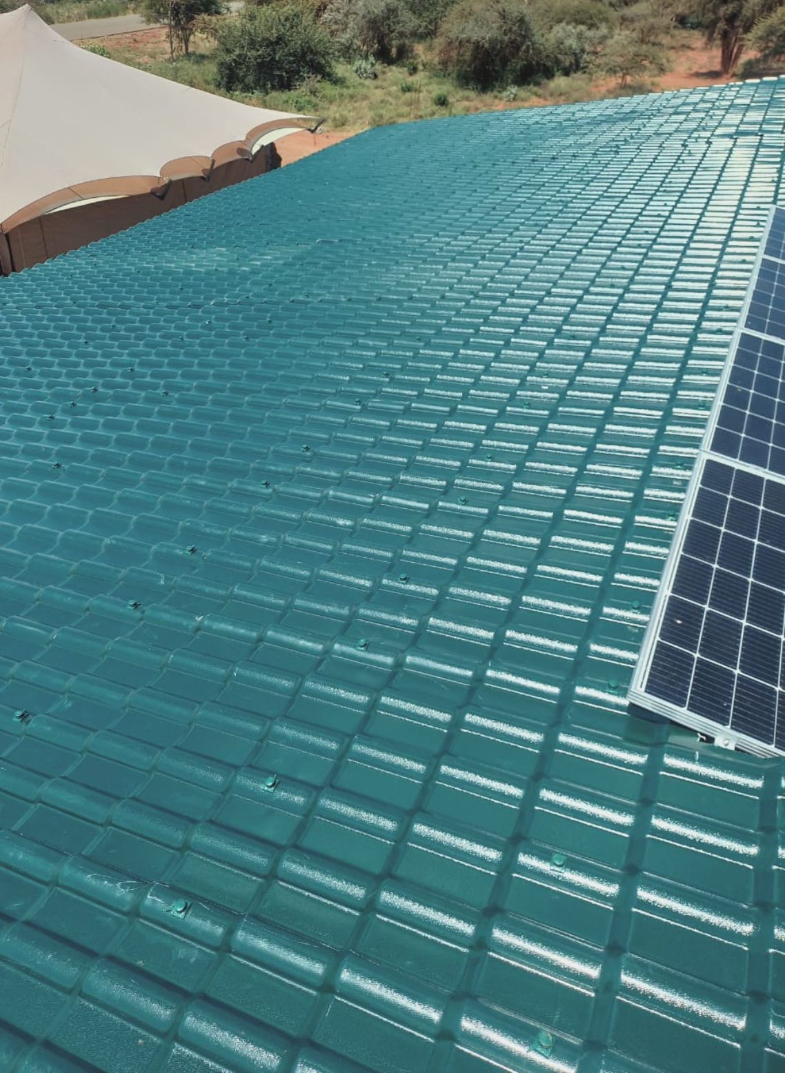 Green Muwi SRT tiles on a home